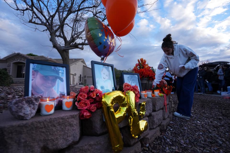 Mar 7, 2024; Queen Creek, AZ, US; Community members hold a vigil for Preston Lord at the Queen Creek neighborhood location where he was attacked during a party in October 2023.