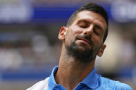 Novak Djokovic, of Serbia, reacts during a match against Taylor Fritz, of the United States, during the quarterfinals of the U.S. Open tennis championships, Tuesday, Sept. 5, 2023, in New York. (AP Photo/Manu Fernandez)