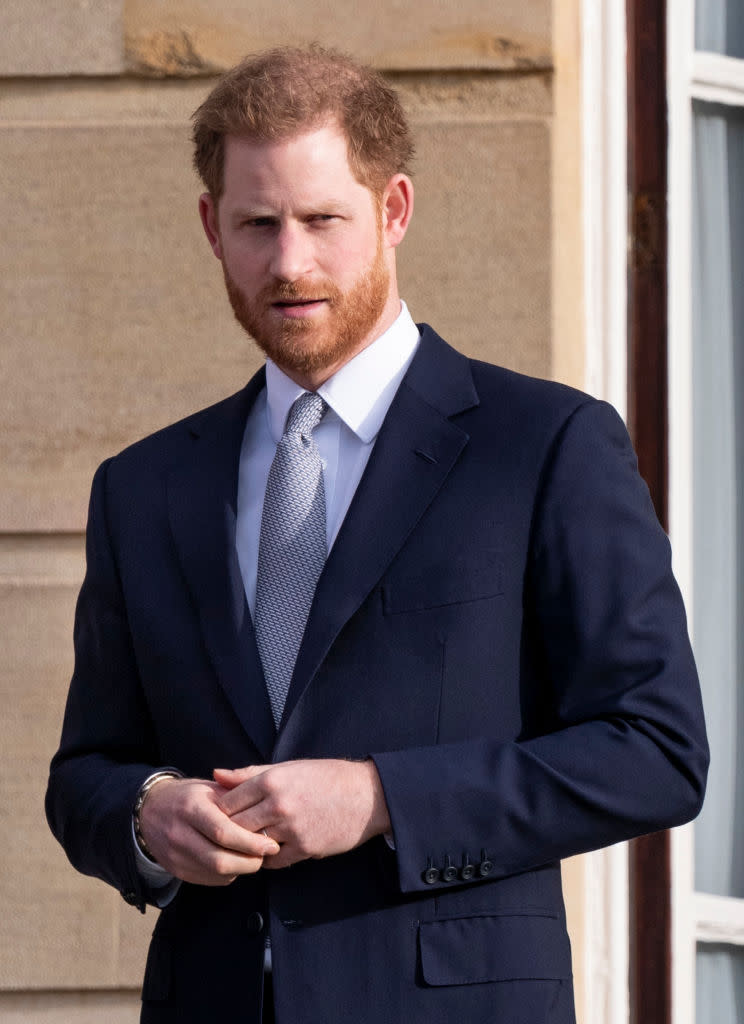 Prince Harry didn't answer questions about the future after being quizzed by reporters [Photo: Getty]