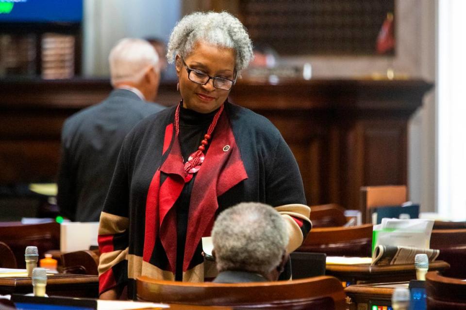 Representative Wendy Brawley speaks with colleagues before session at the South Carolina Statehouse on Wednesday, December 1, 2021.