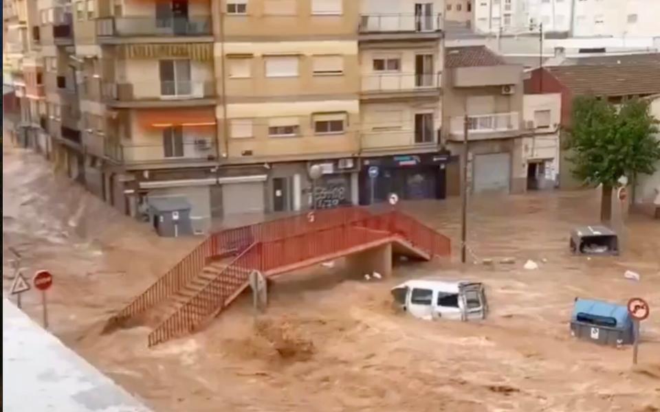 Videos on social media showed water surging through the streets of Murcia, the capital of an area popular with British holidaymakers