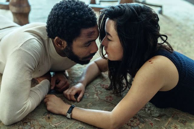 <p>David Lee/Prime Video</p> Donald Glover, Maya Erskine