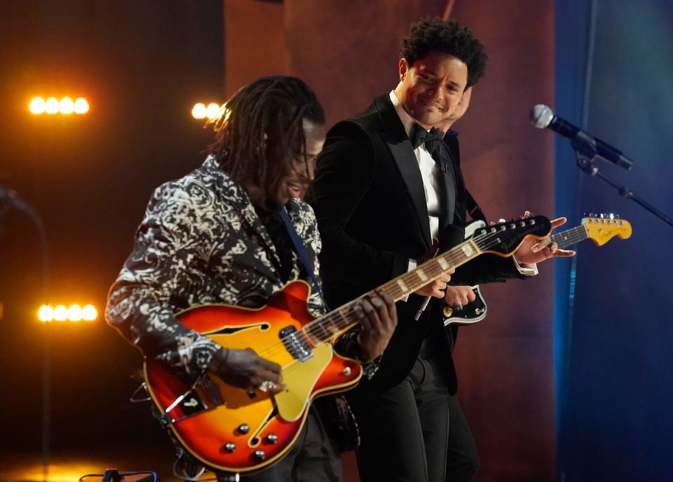 Black Pumas onstage with Grammys host Trevor Noah (Invision)