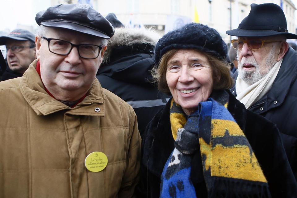 Serge Klarsfeld, a French historian, lawyer and Holocaust survivor, left, and his German-born wife Beate Klarsfeld, center, attend a pro-Israel demonstration in front of Israel embassy in Paris, France, Sunday, Jan. 15, 2017. Fearing a new eruption of violence in the Middle East, more than 70 world diplomats gathered in Paris on Sunday to push for renewed peace talks that would lead to a Palestinian state. (AP Photo/Francois Mori)