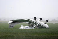 A plane that was flipped by strong winds from Cyclone Debbie is seen at the airport in the town of Bowen, located south of the northern Australian city of Townsville, March 29, 2017. AAP/Sarah Motherwell/via REUTERS
