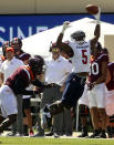 Richmond's Jasiah Williams (5) attempts to make a one handed catch in the first half of the Richmond Virginia Tech NCAA college football game in Blacksburg, Va., Saturday, Sept. 25 2021. (Matt Gentry/The Roanoke Times via AP)