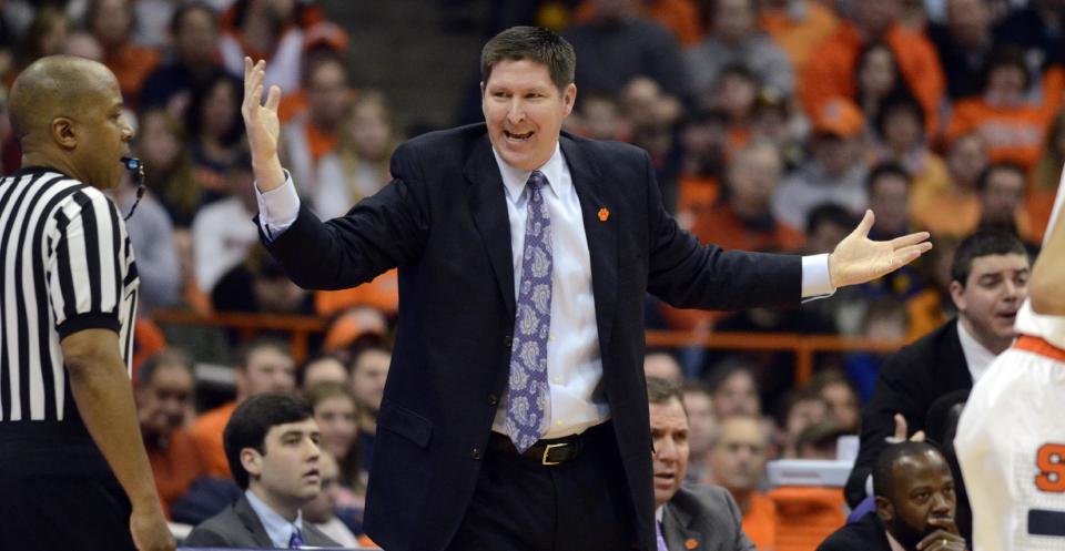 Clemson head coach Brad Brownwell lodges a complaint during the first half against Syracuse in an NCAA college basketball game in Syracuse, N.Y., Sunday, Feb. 9, 2014. (AP Photo/Kevin Rivoli)