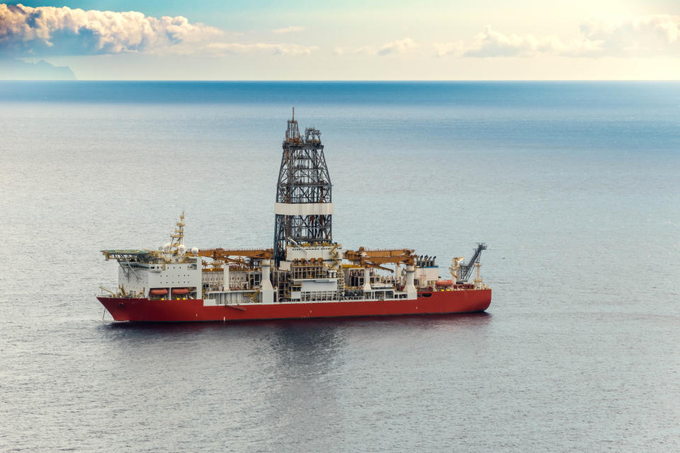 An offshore drillship on the water