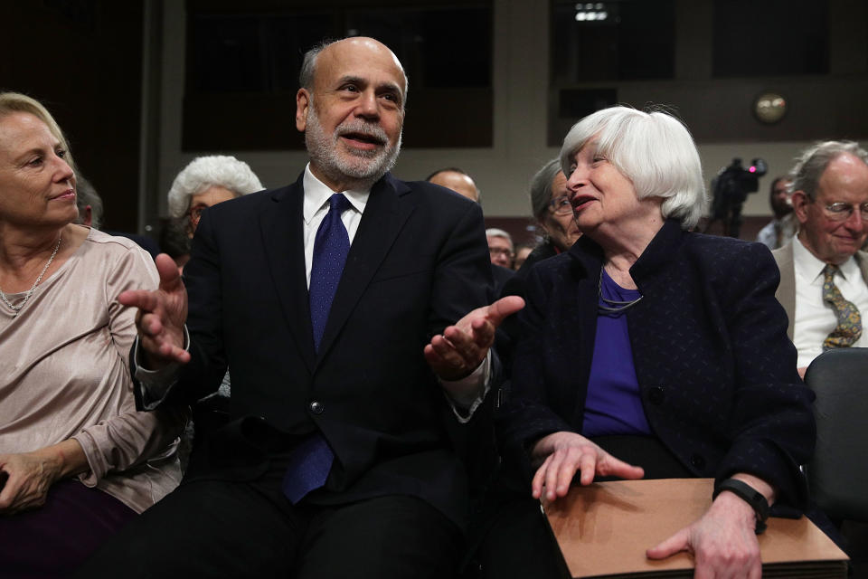 WASHINGTON, DC - NOVEMBER 07:  Federal Reserve Board Chair Janet Yellen (R) chats with former Federal Reserve Board Chairman Ben Bernanke (2nd L) as his wife Anna Friedmann (L) looks on during the Paul H. Douglas Award for Ethics in Government ceremony November 7, 2017 on Capitol Hill in Washington, DC. The University of Illinois' Institute of Government and Public Affairs held a ceremony to honor the recipients.  (Photo by Alex Wong/Getty Images)