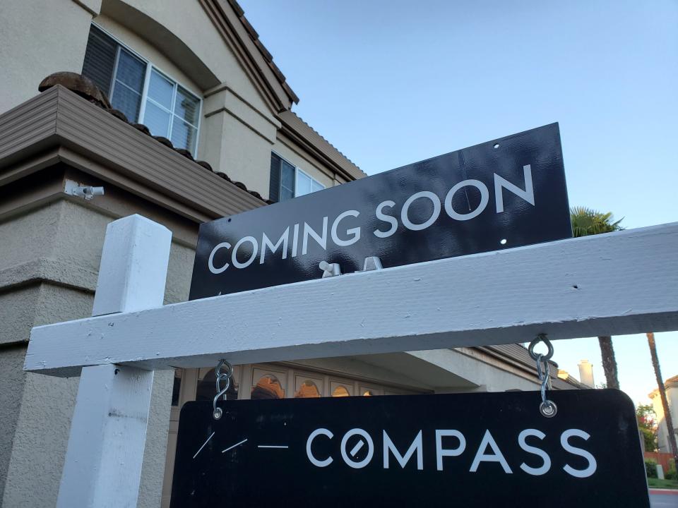 compass real estate brokerage sign