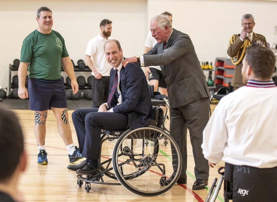 <p>A rare PDA moment between Prince Charles and his son William during a visit to a medical rehab center in Loughborough.</p>