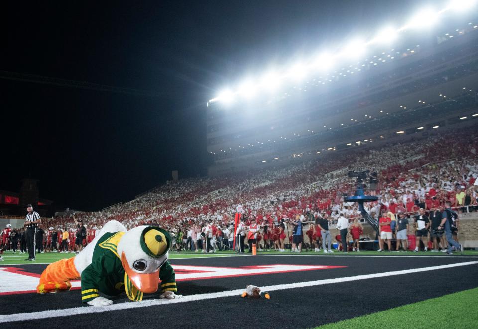 The Oregon Duck does push-ups after the team scores against Texas Tech, Saturday, Sept. 9, 2023, at Jones AT&T Stadium.