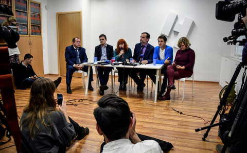 Maksim Lapunov along with human rights and gay rights activists during the Moscow press conference - Credit: ALEXANDER NEMENOV/AFP