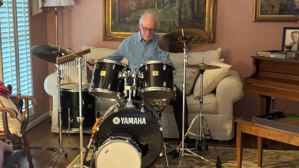 Jan Gardner plays drums at his home in Dunwoody, Georgia. - CNN