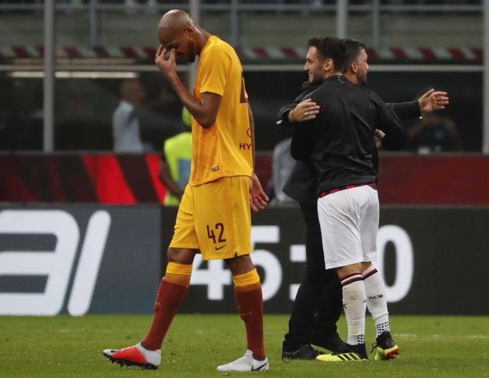Roma's Steven Nzonzi walks off the pitch at the end of the Serie A soccer match between AC Milan and Roma at the Milan San Siro Stadium, Italy, Friday, Aug. 31, 2018. AC Milan won 2-1. (AP Photo/Antonio Calanni)