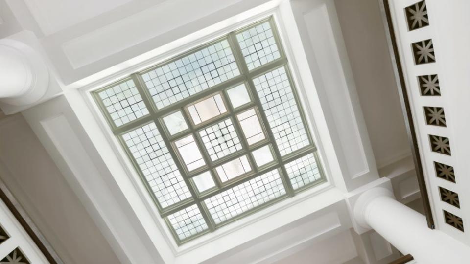 John Hudson Thomas's favored square patterns shine through the atrium skylight, surrounded by his signature starburst pattern.