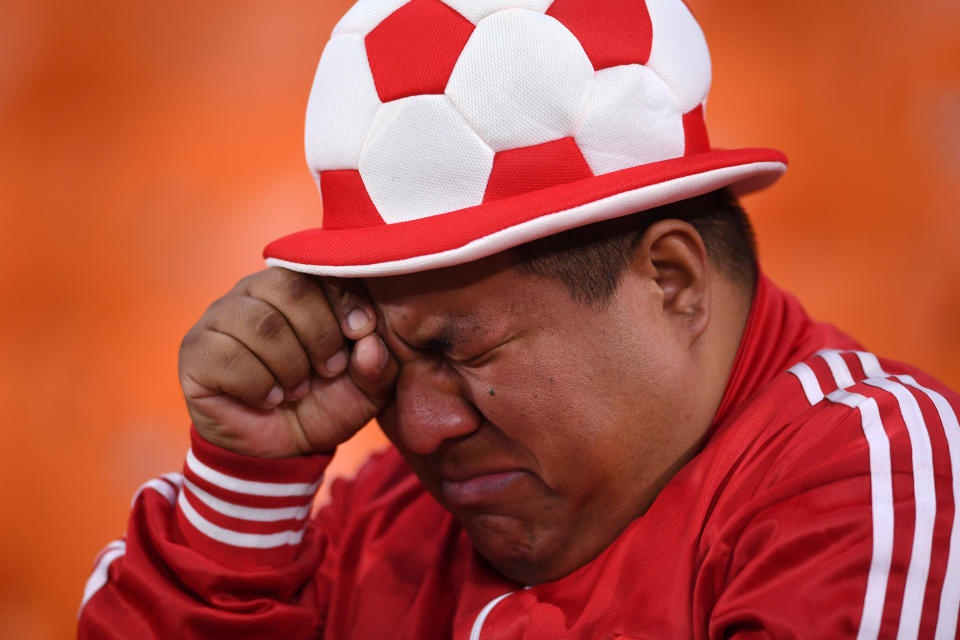 <p>It’s all too much for this Peru fan after defeat to France </p>