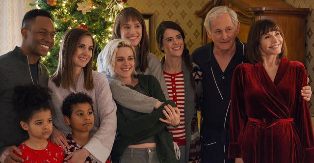 <p>Hulu</p> (Left-right:) Burl Moseley, Asiyih N'Dobe, Anis N'Dobe, Alison Brie, Kristen Stewart, Mackenzie Davis, Mary Holland, Victor Garber and Mary Steenburgen in "Happiest Season"