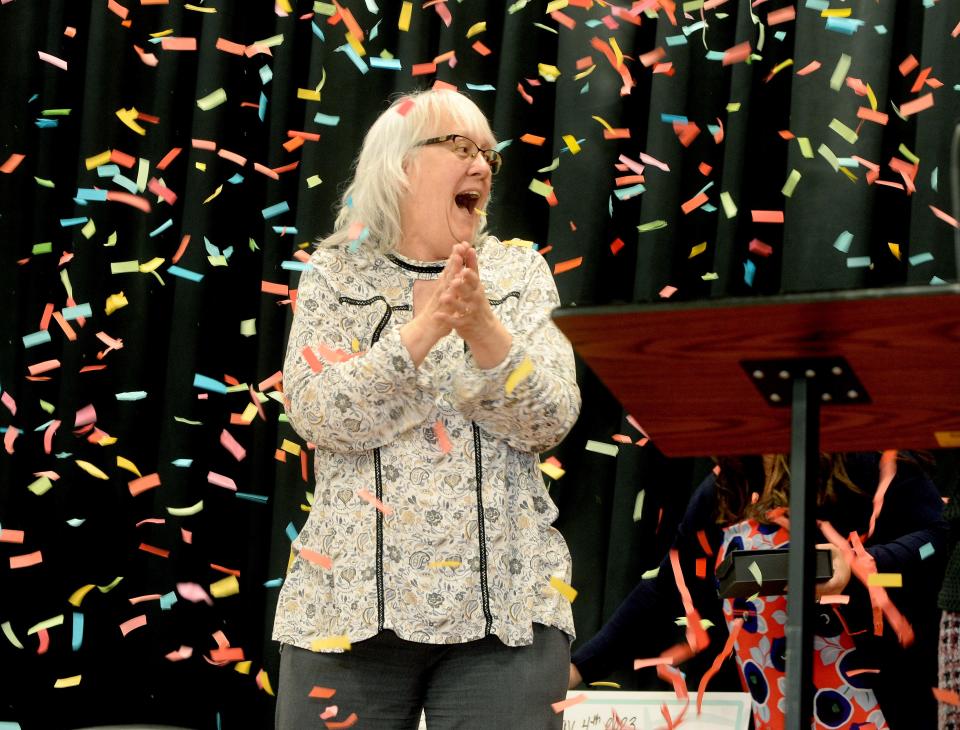 Fairview Elementary fourth grade teacher Kathy Fox reacts to winning the Horace Mann Educator of the Year award during an assembly at the school Thursday, May 4, 2023.