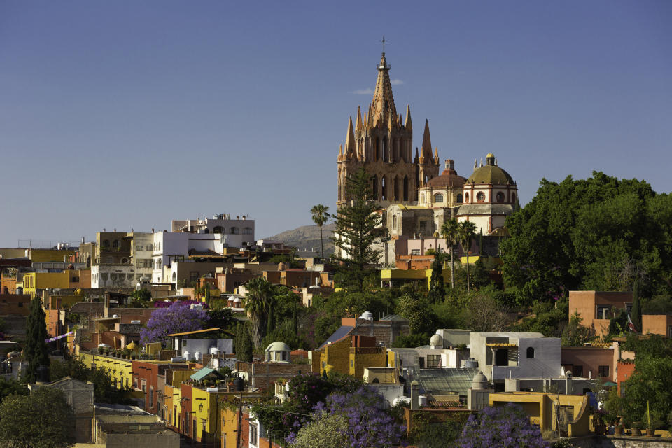 The pink spires of the Parroquia de San Miguel Arcángel church can be seen from across San Miguel de Allende