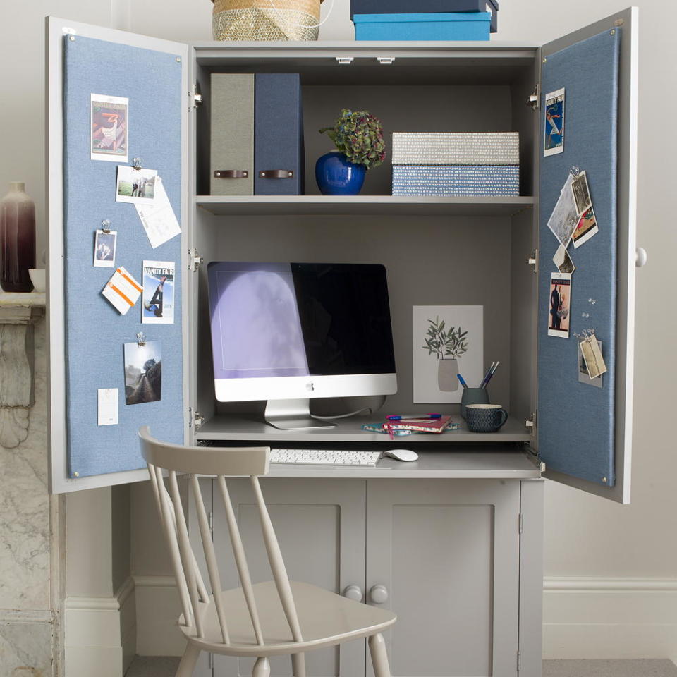 Conceal your desk inside a cupboard
