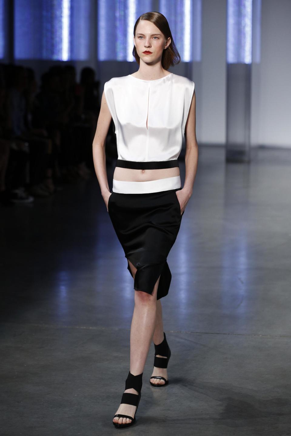 The Helmut Lang Spring 2014 collection is modeled during Fashion Week in New York, Friday, Sept. 6, 2013. (AP Photo/John Minchillo)