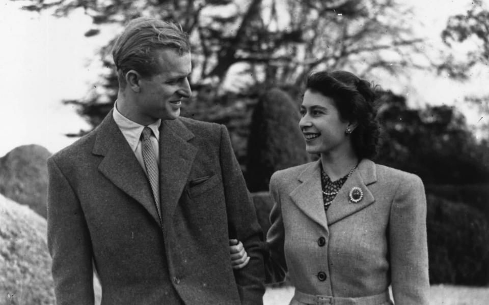 Princess Elizabeth and Prince Philip, the Duke of Edinburgh enjoying a walk during their honeymoon in Hampshire - Hulton Archive/Getty Images/Topical Press Agency