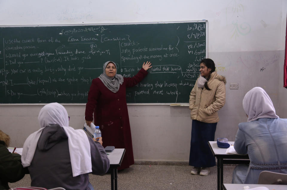 Fatma Youssef, 17, a Palestinian high school student and a horse rider, stands at the front of the class during an English language lesson at her school in Gaza City, Feb. 7, 2019. "I'm nervous because this is my final high school year, but when I ride my horse I become free of stress," Youssef said. (Photo: Samar Abo Elouf/Reuters)    