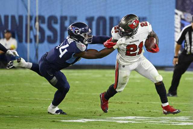 NASHVILLE, TN - AUGUST 20: Tennessee Titans quarterback Malik Willis (7)  catches the snap during the Tampa Bay Buccaneers-Tennessee Titans Preseason  game on August 20, 2022 at Nissan Stadium in Nashville, TN. (