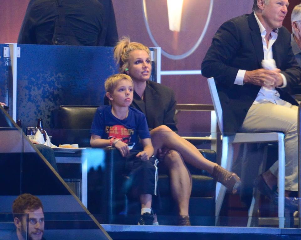 Britney Spears and her son Jayden James Federline attend a hockey game between the New York Rangers and the Los Angeles Kings in 2014 (Getty Images)