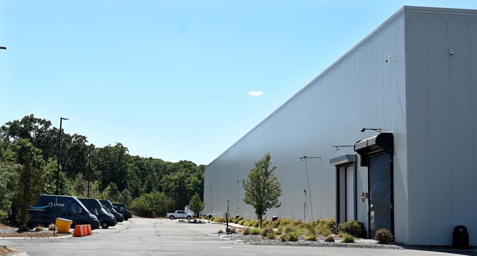 Online commerce giant Amazon announced last week that it was closing five of its Massachusetts delivery centers, including this one at 8 Industrial Drive in Milford, Aug. 19, 2022.