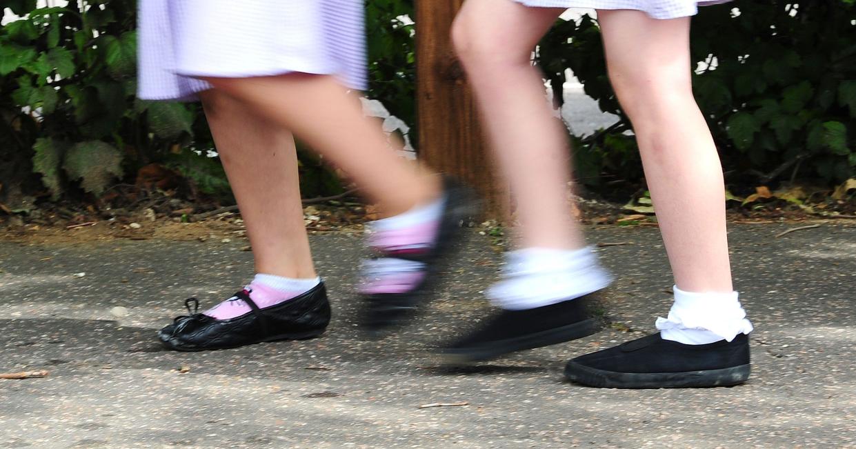 School girls walking to school