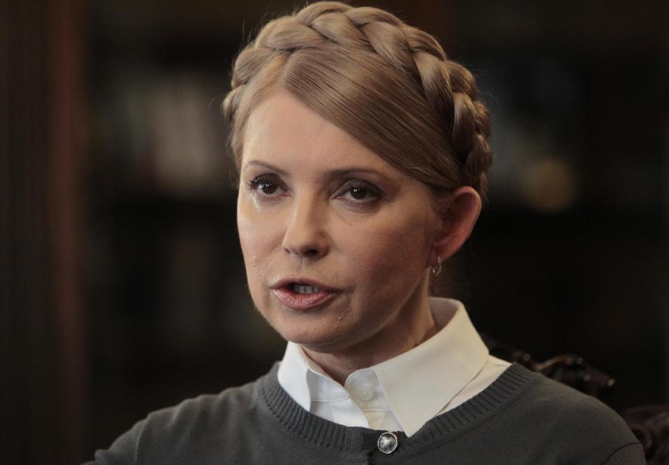 Former Ukrainian Prime Minister and candidate for the upcoming presidential elections Yulia Tymoshenko speaks during an interview with The Associated Press in Kiev, Ukraine, Saturday, April 26, 2014. Tymoshenko says Ukraine “must be a member of NATO” in order to protect itself from Russian aggression. While Tymoshenko has not previously backed NATO membership publicly, she and other Ukrainian politicians have ramped up the tough rhetoric as pro-Russia militias seized police stations and government buildings across eastern Ukraine. (AP Photo/Sergei Chuzavkov)