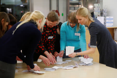 Election officials count votes during general election at the polling station in Tallinn, Estonia March 3, 2019. REUTERS/Ints Kalnins