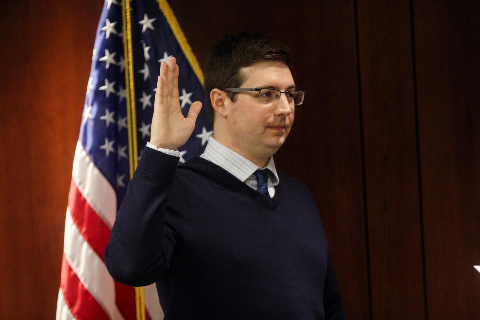 Ottawa County Board of Commissioners Chair Joe Moss takes his oath of office on Tuesday, Jan. 3.