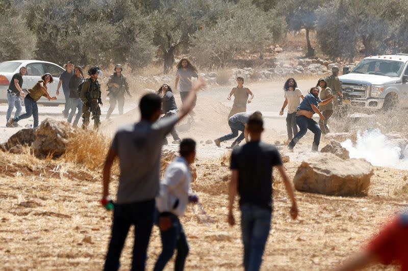 Palestinians protest against Israeli settlement activity in Al Mughayyir village