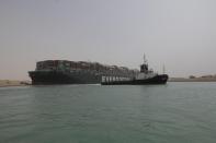 Stranded container ship Ever Given, one of the world's largest container ships, is seen after it ran aground, in Suez Canal