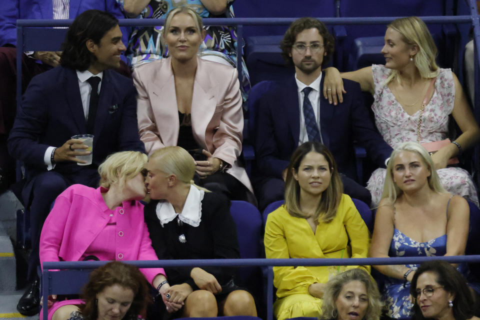 Rebel Wilson kisses girlfriend Ramona Agruma during Serena Williams's match at the 2022 U.S. Open tennis tournament at USTA Billie Jean King National Tennis Center.