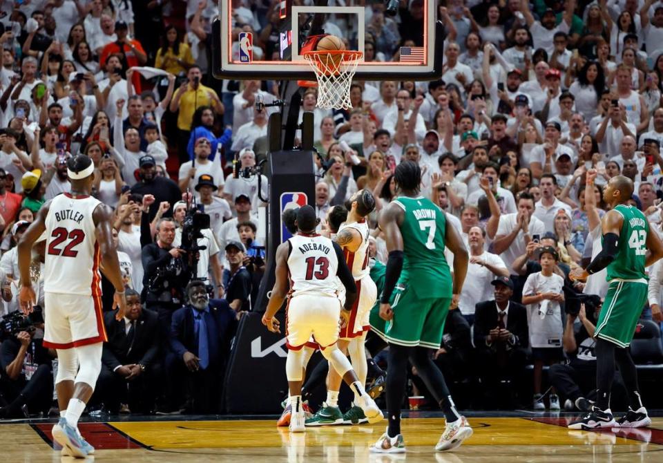 Boston Celtics guard Derrick White (9) scores the game-winning basket against the Miami Heat in Game 6 of the Eastern Conference finals at the Kaseya Center in Miami on Saturday, May 27, 2023.