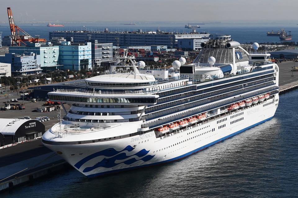 The Diamond Princess cruise ship, with around 3,600 people quarantined onboard due to fears of the new coronavirus, is seen anchored at the Daikoku Pier Cruise Terminal in Yokohama port on February 10, 2020. - Six more people on a cruise ship off Japan are found to have the new coronavirus, the government said February 9, bringing the number who have tested positive on board to 70. (Photo by CHARLY TRIBALLEAU / AFP) (Photo by CHARLY TRIBALLEAU/AFP via Getty Images)