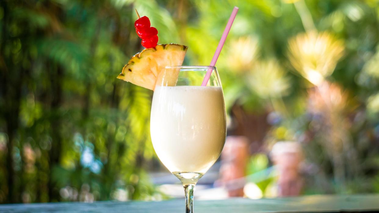  A white frozen drink in an al fresco setting. 