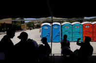 Central American migrants, moving in a caravan through Mexico, rest at a temporary shelter, in Hermosillo, in Sonora state, Mexico April 23, 2018. REUTERS/Edgard Garrido