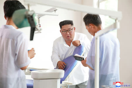 North Korean leader Kim Jong Un inspected the Myohyangsan Medical Appliances Factory in this undated photo released by North Korea's Korean Central News Agency (KCNA) on August 21, 2018. KCNA via REUTERS