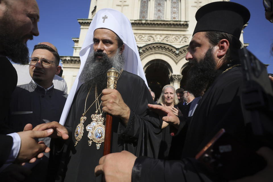 People greet the newly elected Bulgarian Patriarch Daniil after his enthronement ceremony at Alexander Nevsky Cathedral in Sofia, Bulgaria, Sunday, June 30, 2024. Bulgaria's Orthodox Church on Sunday elected Daniil, a 52-year-old metropolitan considered to be pro-Russian, as its new leader in a disputed vote that reflects the divisions in the church and in the society. (AP Photo/Valentina Petrova)