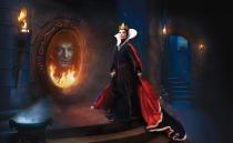 Olivia Wilde as the evil queen and Alec Baldwin as the magic mirror (Credit: Annie Leibovitz/Disney Parks.com)