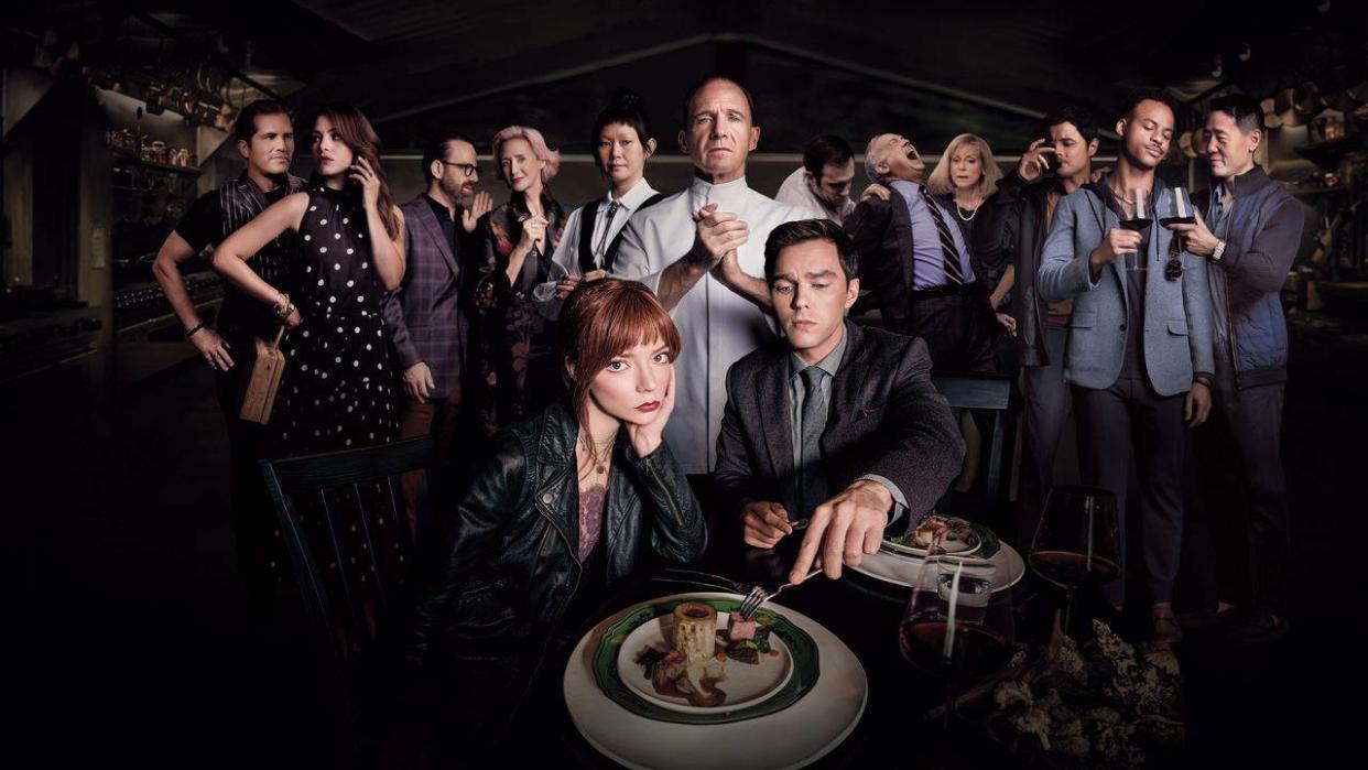  A promotional image showing the main cast of The Menu movie in front of a black background. 