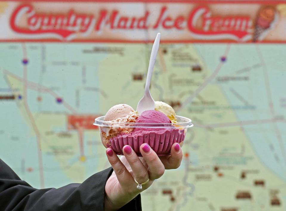 A scoop of honey, black raspberry and penuche ice cream at Country Maid.