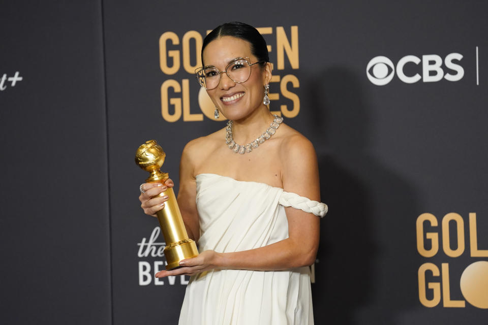 Ali Wong poses in the press room with the award for best performance by an actress in a limited series, anthology series, or a motion picture made for television for "Beef" at the 81st Golden Globe Awards on Sunday, Jan. 7, 2024, at the Beverly Hilton in Beverly Hills, Calif. (AP Photo/Chris Pizzello)