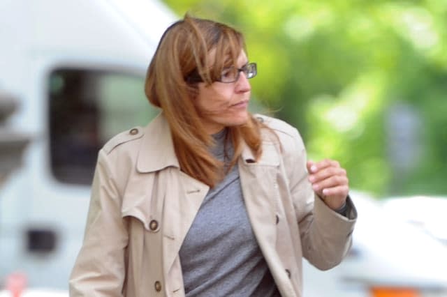 Geraldine Boulter leaving Cardiff crown court - A mother who cheated the benefits system of ï¿½78,000 because her partner gambled and drank away the money he earned, has been given a suspended sentence by a judge who said she was doing the best she could for her family.Geraldine Boulter, 44 and put in the dock following a tip-off to the authorities, was also told by Judge Philip Richards that perhaps she could use her experience to help others in the same position.Cardiff Crown Court heard how she started claiming in 1996 because she was ï¿½single, unemployed and incapacitatedï¿½.