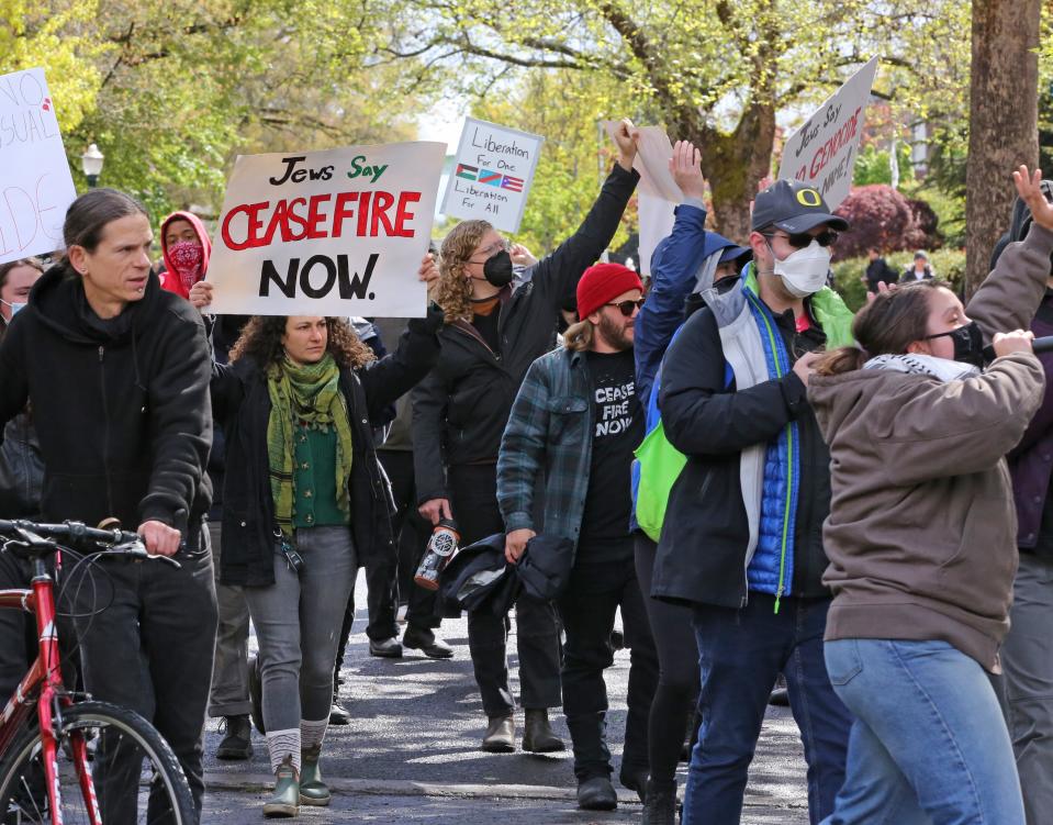 Supporters march to a protest camp at the University of Oregon demanding justice in the Palestinian territories.